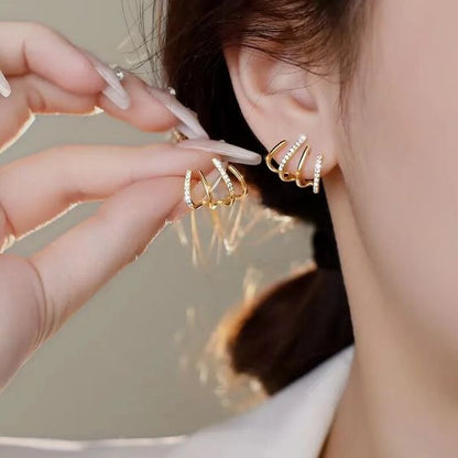 Alma – Gold-Plated Spiral Earrings